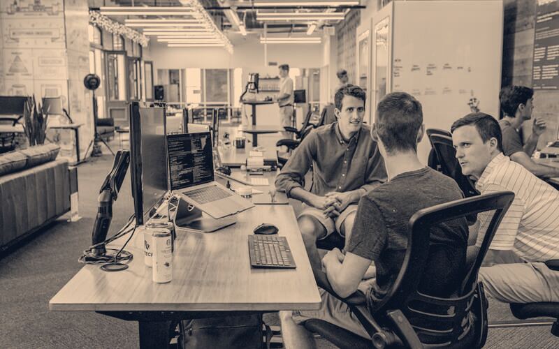 Product team working together in an open office